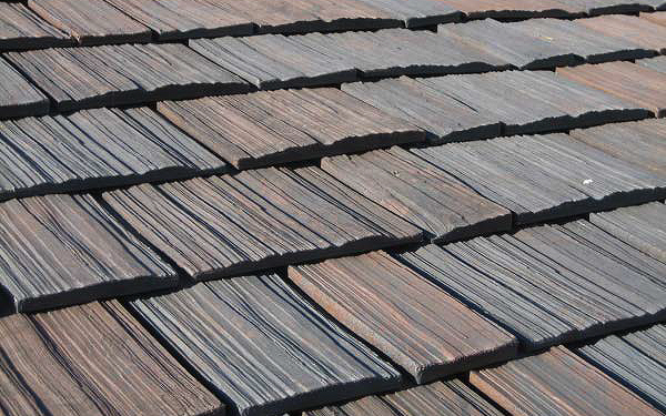 Composite roofing tiles