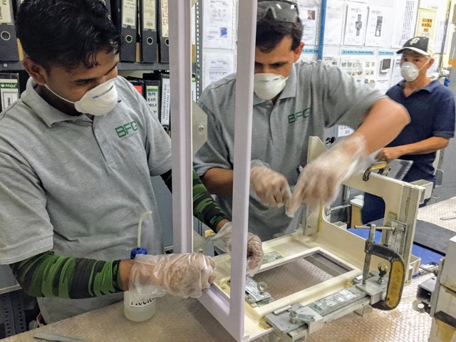 BFG engineer assembling composite cabin components